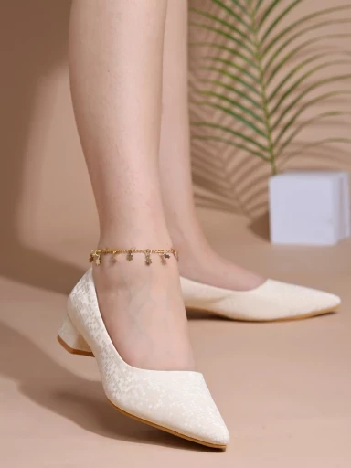 Stylestry Embellished Shimmery Cream Pumps For Women & Girls.