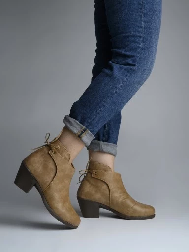 Stylestry Womens & Girls Beige Solid Heeled Boots