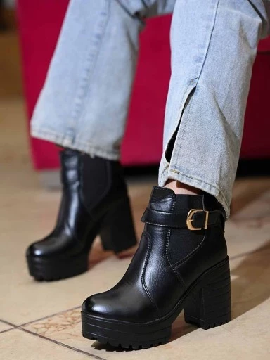 Stylestry Women Black Solid Heeled Boots