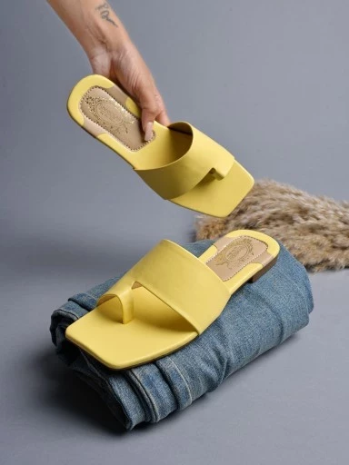 Stylestry One-Toe Slip-On Yellow Flats For Women & Girls