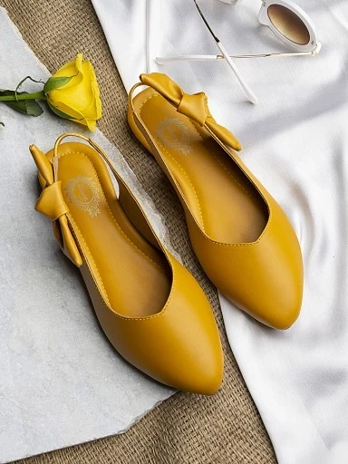 Stylestry Womens & Girls Yellow Embellished Mules with Bows Flats